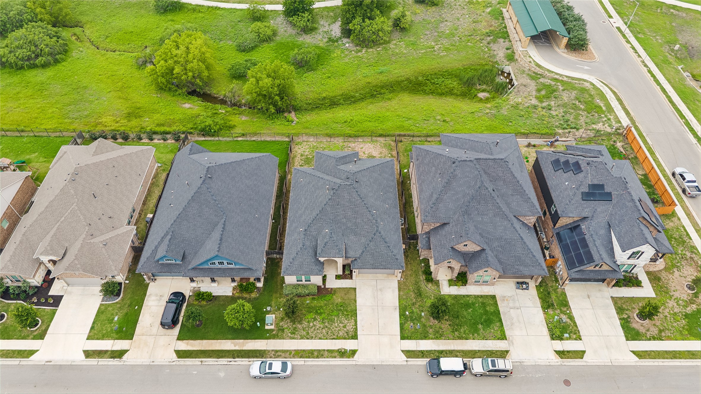 298 Wild Pecan Loop Buda, TX 78610 - Photo 38 of 40 an aerial view of residential houses with outdoor space and street view