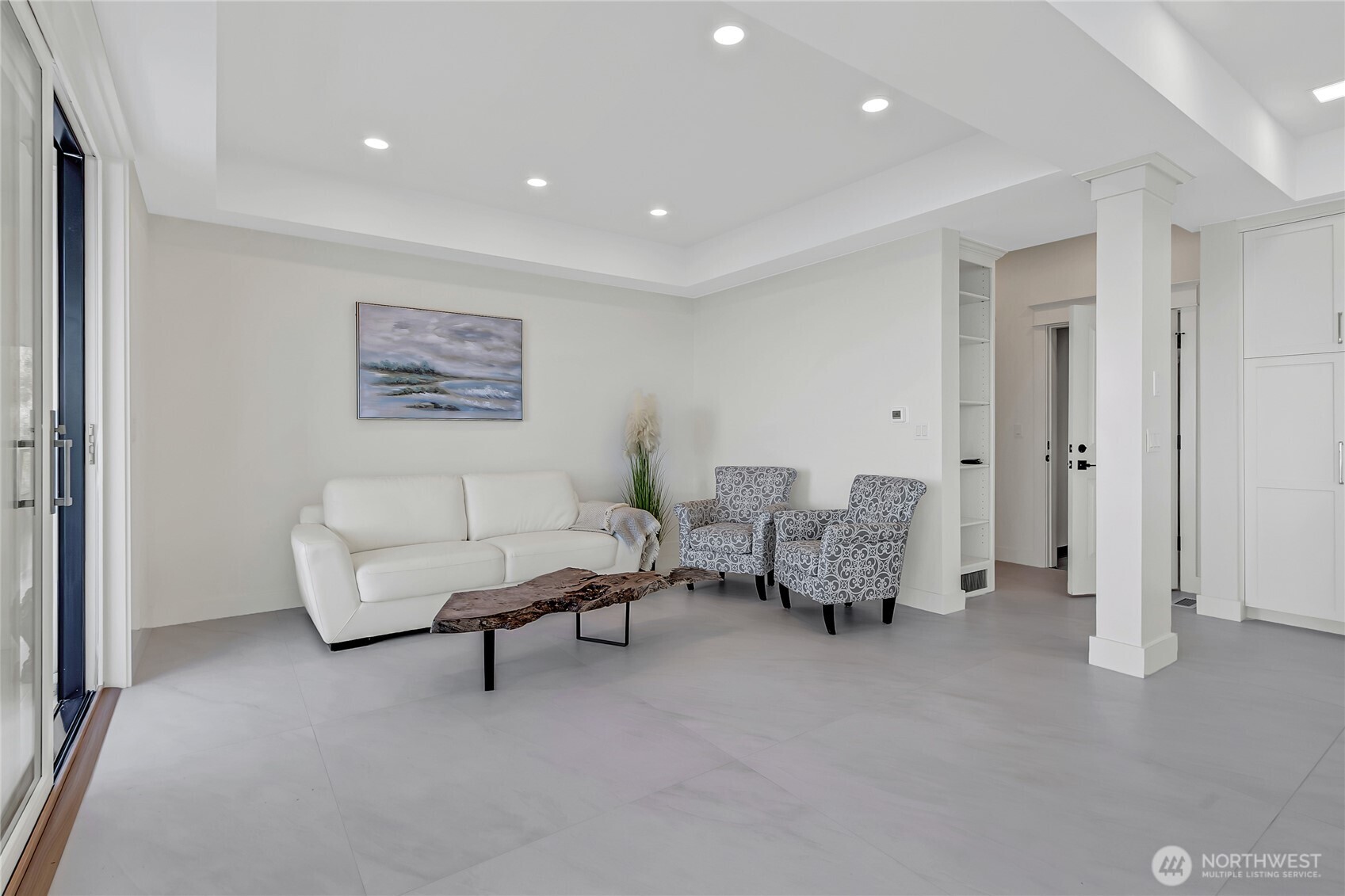 16331 Maplewild Avenue Southwest Burien, WA 98166 - Photo 11 of 31 a living room with furniture and a lamp