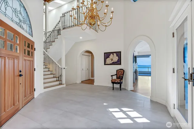 a view of workspace with wooden floor and windows
