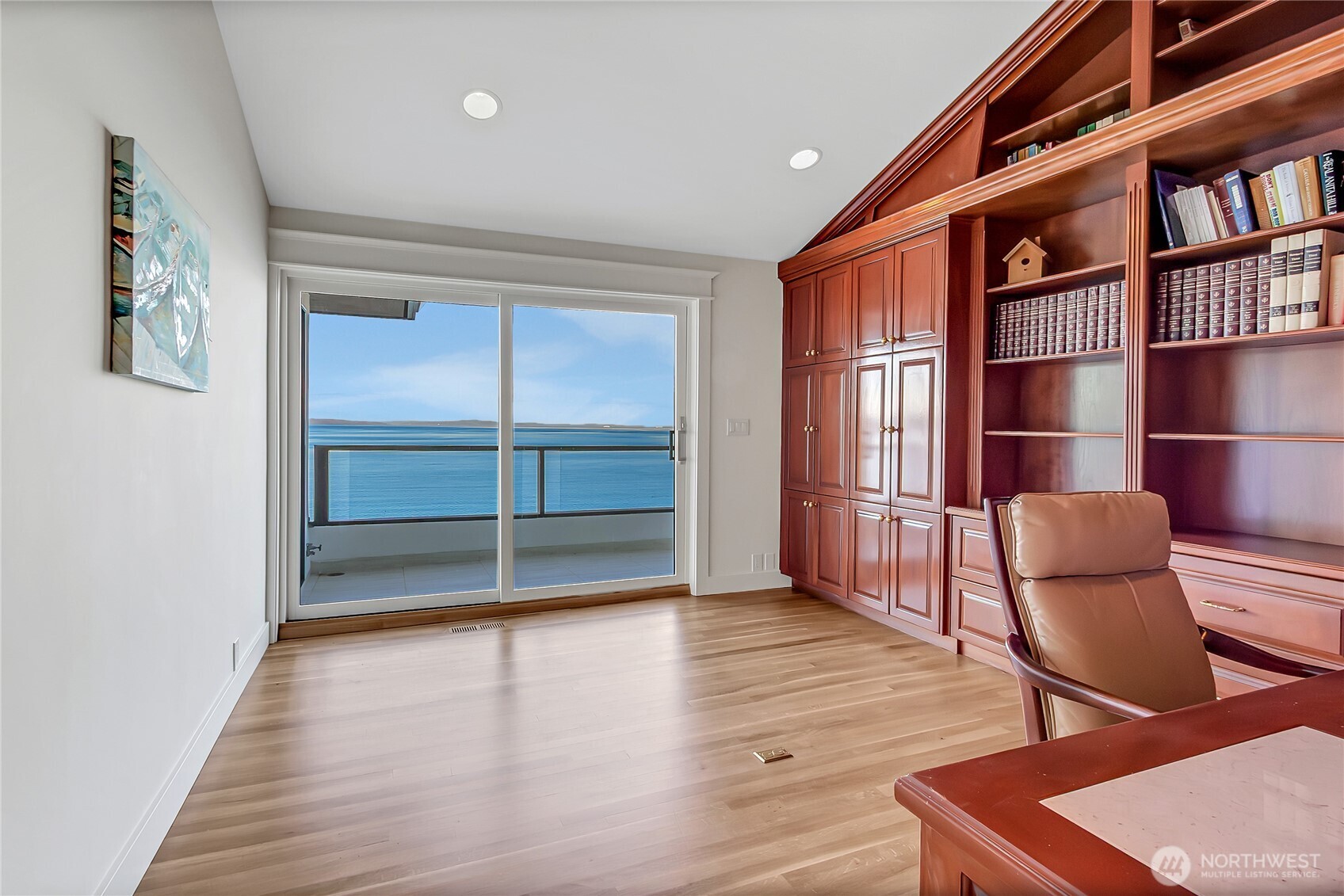 16331 Maplewild Avenue Southwest Burien, WA 98166 - Photo 19 of 31 a view of workspace with wooden floor and windows