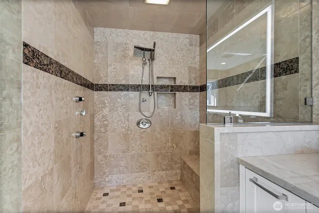 a living room with fireplace furniture and a wooden floor