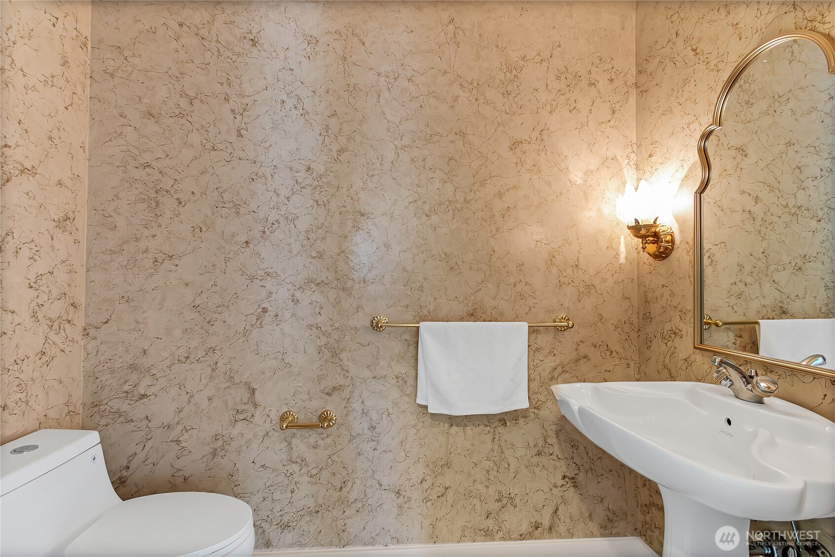 16331 Maplewild Avenue Southwest Burien, WA 98166 - Photo 27 of 31 a bathroom with a toilet sink and mirror