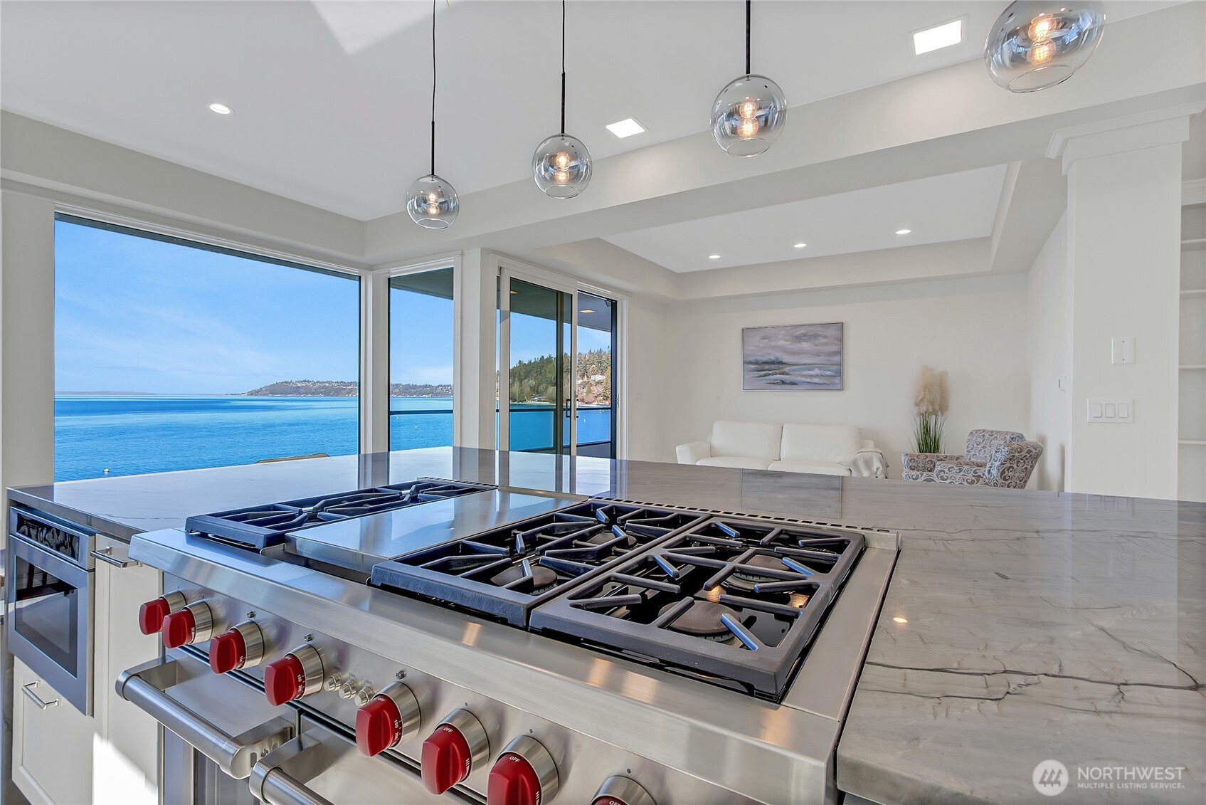16331 Maplewild Avenue Southwest Burien, WA 98166 - Photo 5 of 31 a kitchen with stove and a chandelier