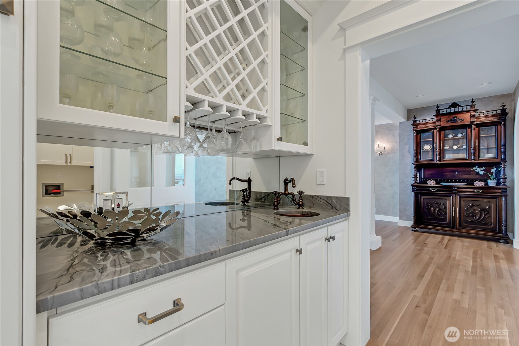 16331 Maplewild Avenue Southwest Burien, WA 98166 - Photo 8 of 31 a kitchen with stainless steel appliances kitchen island granite countertop a sink and cabinets