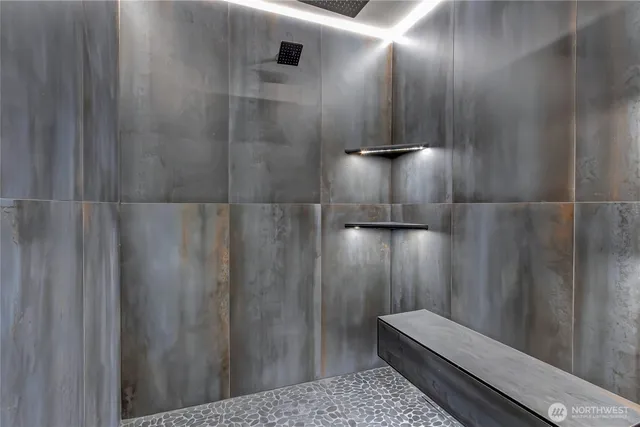 a living room with furniture and a lamp