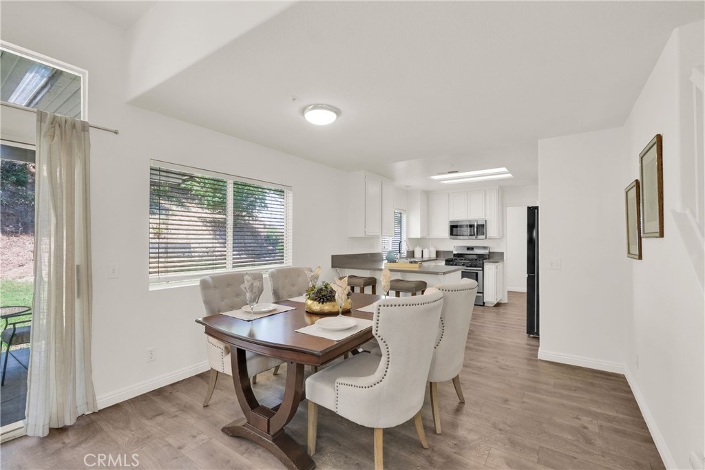 5895 Applecross Drive Riverside, CA 92507 - Photo 13 of 35 a view of a dining room with furniture and window