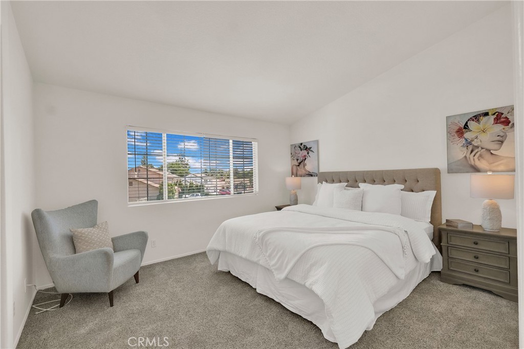 5895 Applecross Drive Riverside, CA 92507 - Photo 17 of 35 a bedroom with a bed and a couch