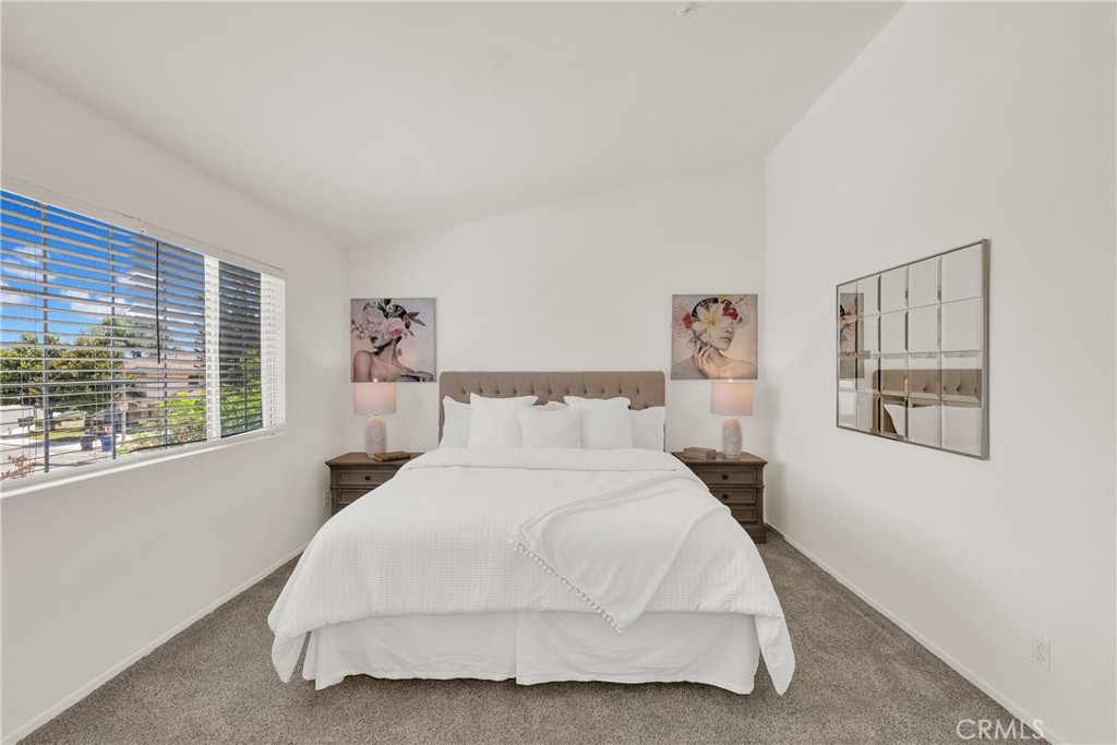 5895 Applecross Drive Riverside, CA 92507 - Photo 18 of 35 a large white bed in a white room
