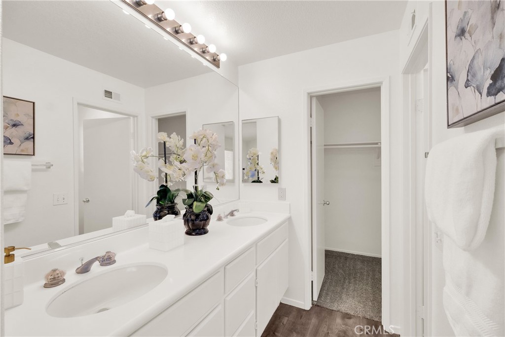 5895 Applecross Drive Riverside, CA 92507 - Photo 20 of 35 a bathroom with a sink and a mirror