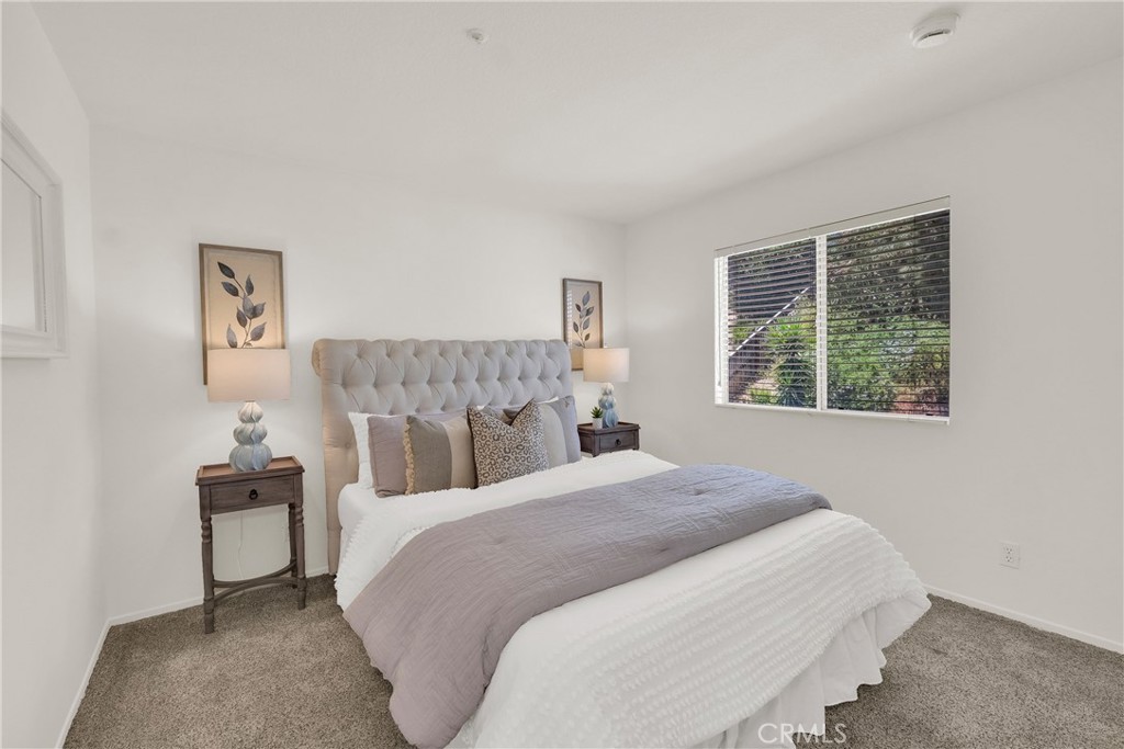 5895 Applecross Drive Riverside, CA 92507 - Photo 24 of 35 a bedroom with a bed and a window