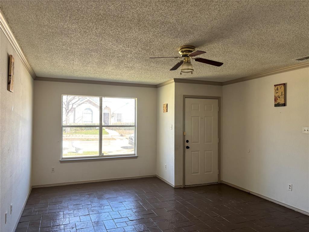 2313 Foot Hill Road McKinney, TX 75072 - Photo 2 of 13 a view of an empty room with a window