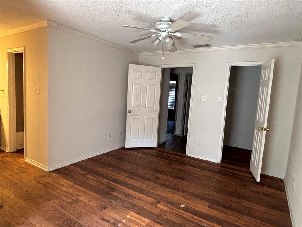 2313 Foot Hill Road McKinney, TX 75072 - Photo 5 of 13 a view of an empty room with wooden floor