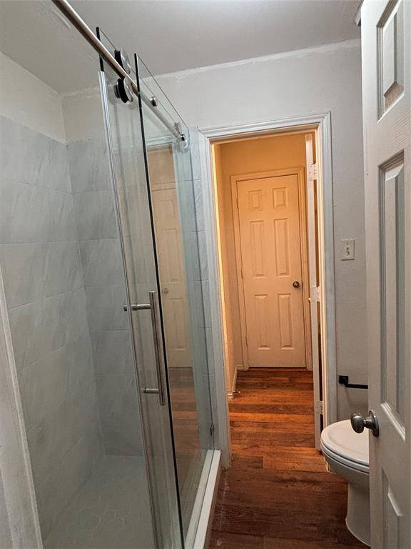 2313 Foot Hill Road McKinney, TX 75072 - Photo 8 of 13 a bathroom with a shower and a toilet