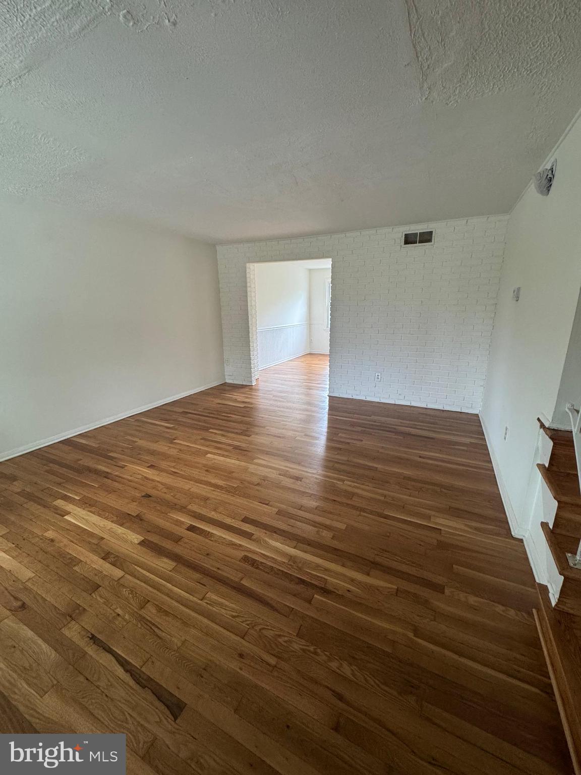 2128 Cockspur Road Middle River, MD 21220 - Photo 2 of 28 wooden floor in an empty room