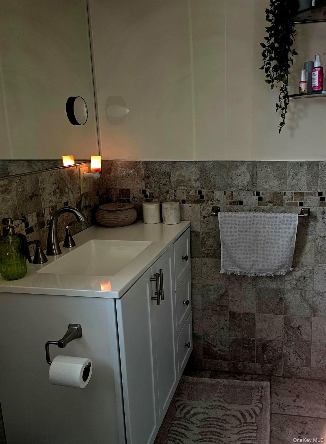 85 Swinging Bridge Estate Road Monticello, NY 12701 - Photo 5 of 12 a bathroom with a sink a mirror and shower