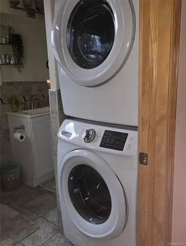 a utility room with dryer and washer