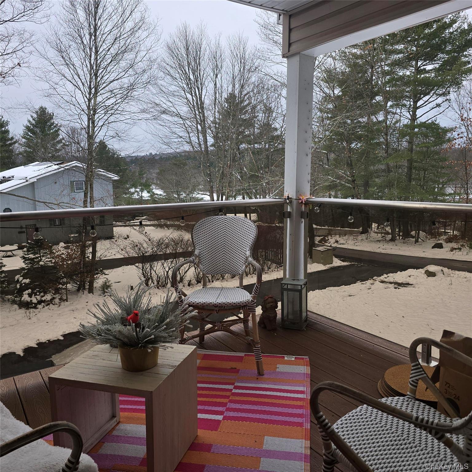 85 Swinging Bridge Estate Road Monticello, NY 12701 - Photo 8 of 12 a view of a balcony with chairs