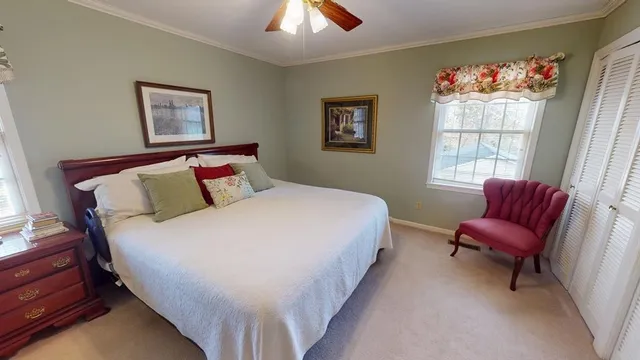 a white toilet sitting next to a bathroom sink