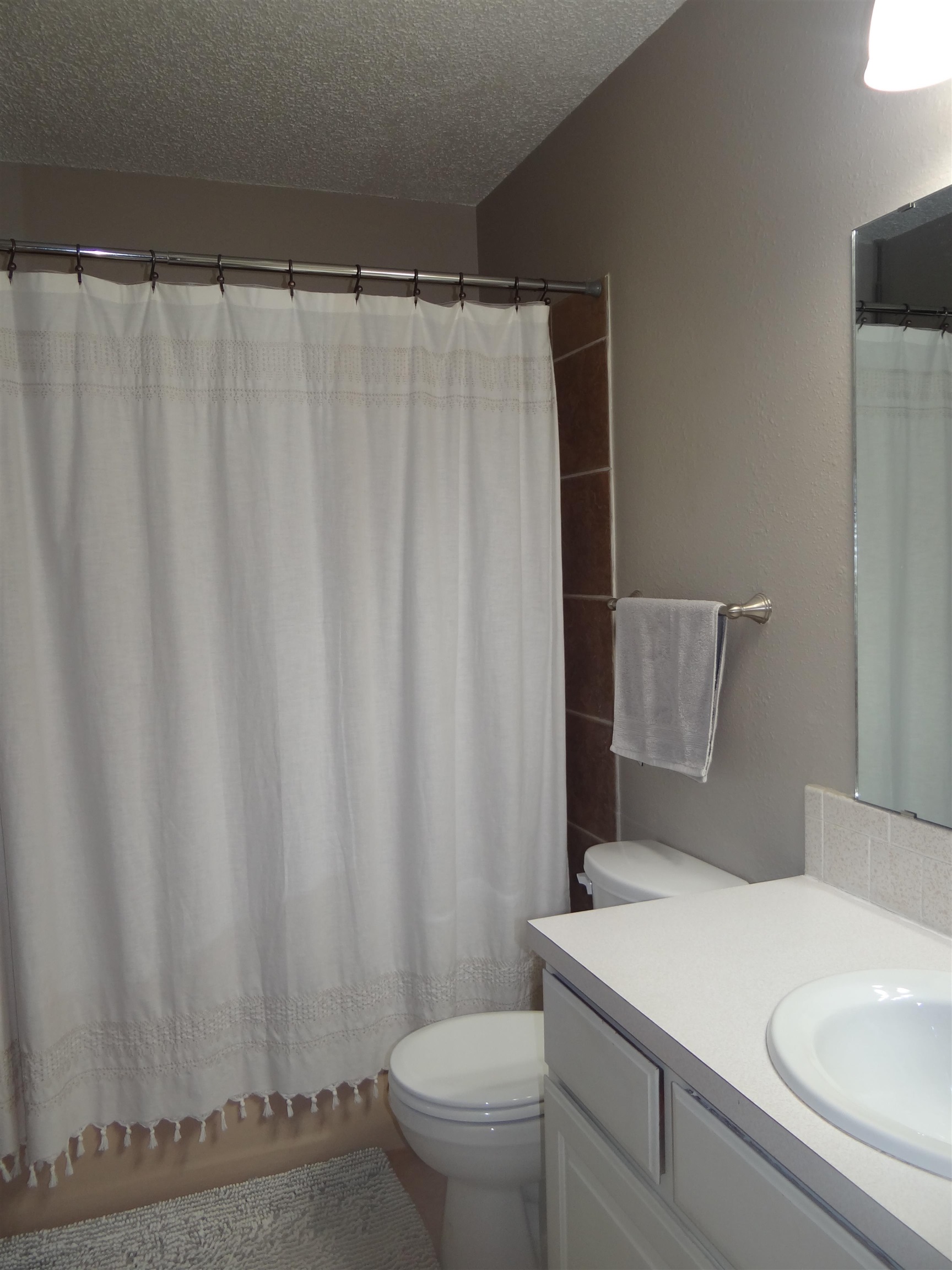 2721 Patterson Road, Unit 904 Grand Junction, CO 81506 - Photo 14 of 23 a bathroom with a sink and a toilet