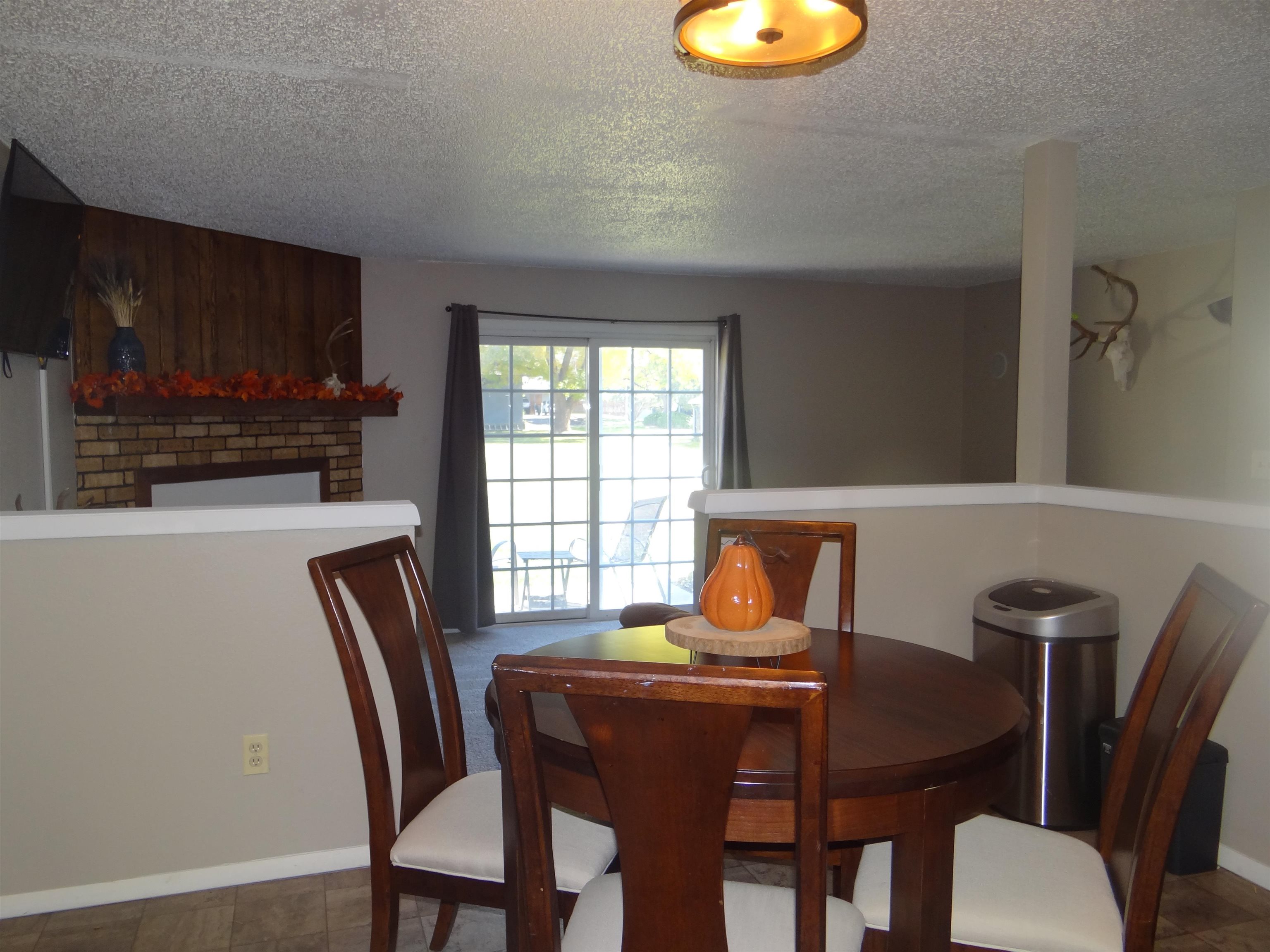 2721 Patterson Road, Unit 904 Grand Junction, CO 81506 - Photo 6 of 23 a dining room with furniture and window