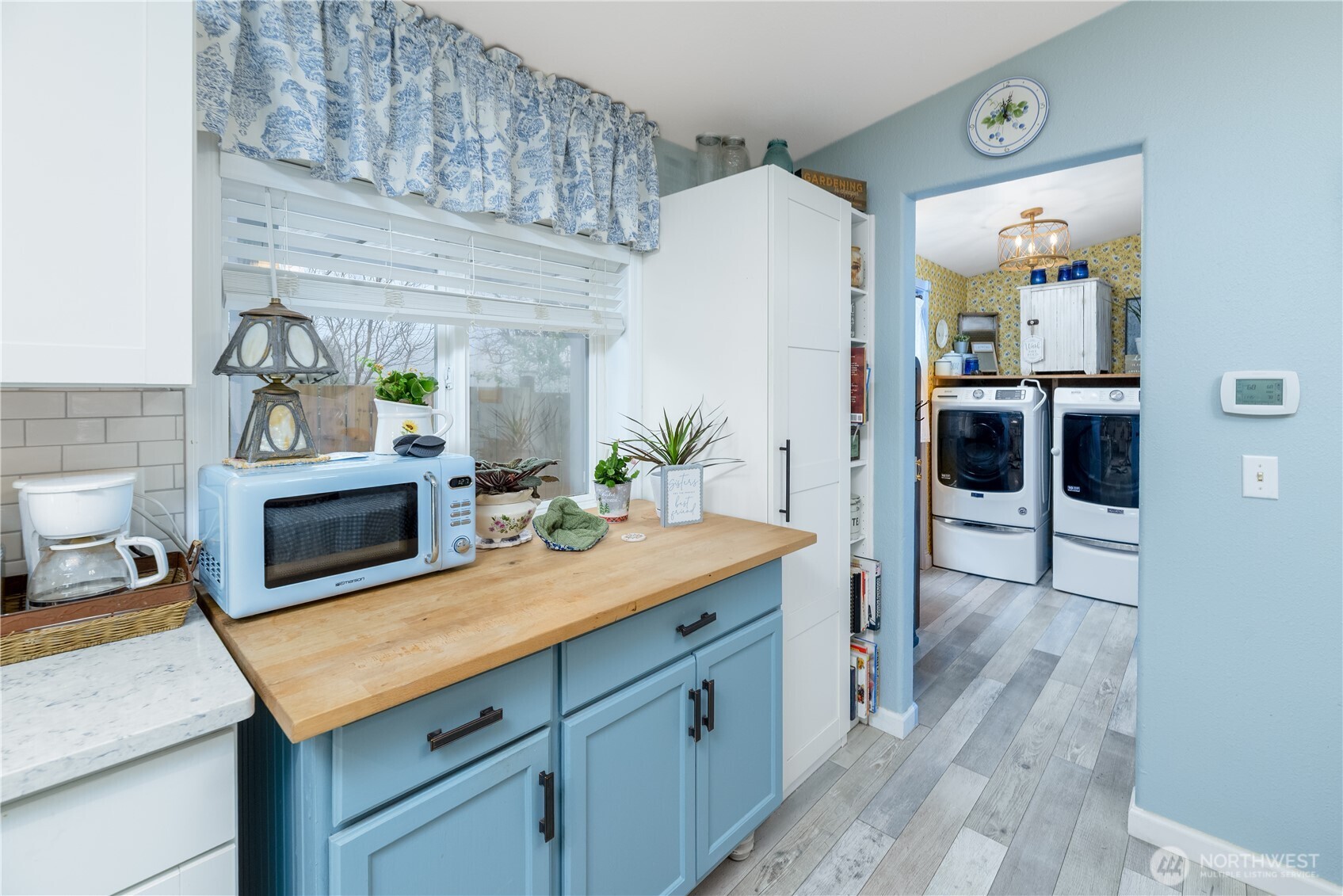 1238 West 11th Street Port Angeles, WA 98363 - Photo 12 of 26 a kitchen with a sink and a stove top oven