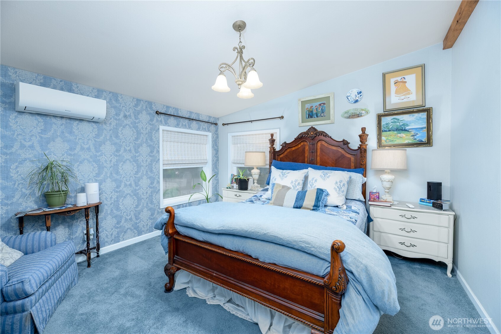 1238 West 11th Street Port Angeles, WA 98363 - Photo 13 of 26 a bedroom with a bed wooden floor and window