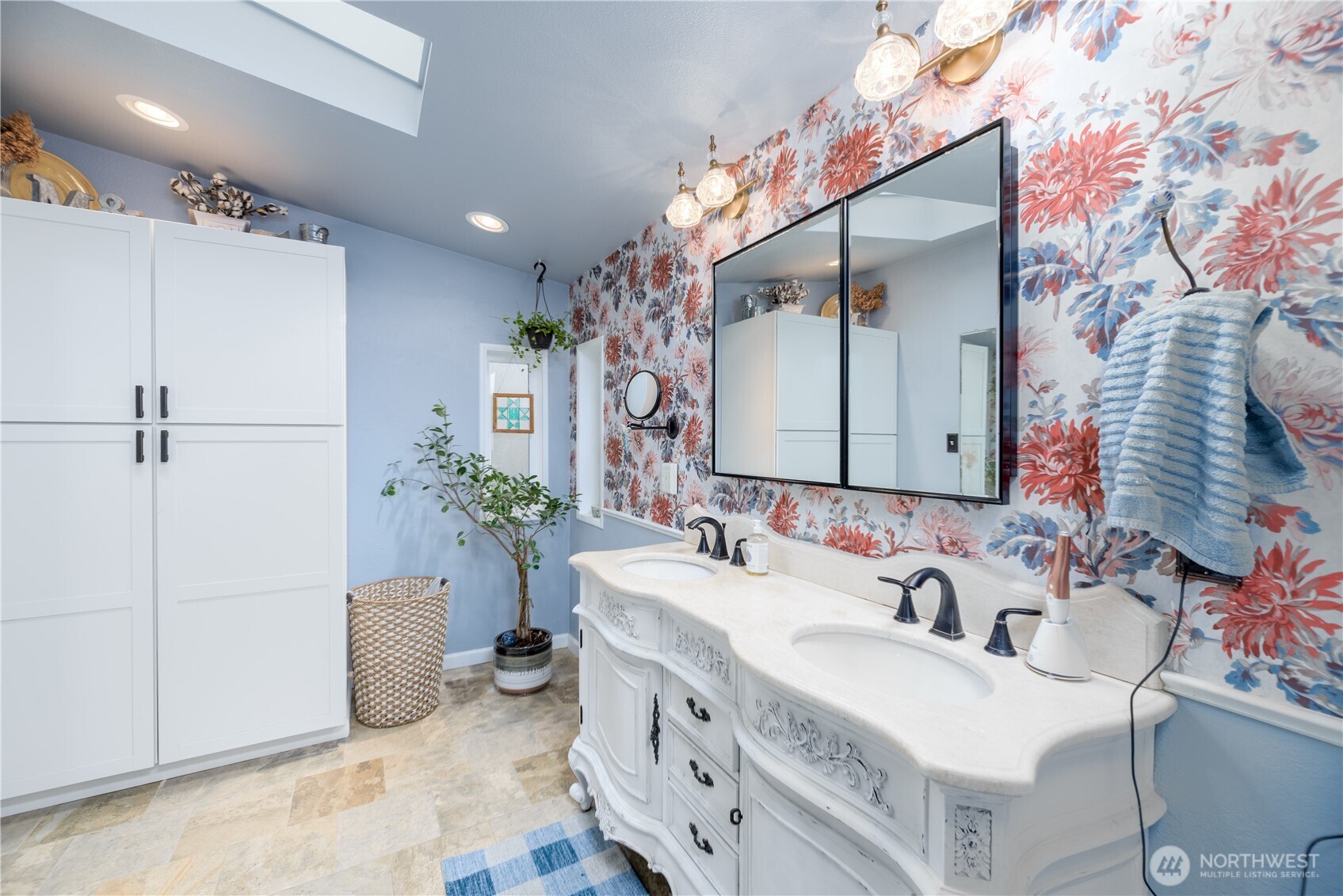 1238 West 11th Street Port Angeles, WA 98363 - Photo 14 of 26 a spacious bathroom with a double vanity sink and a mirror