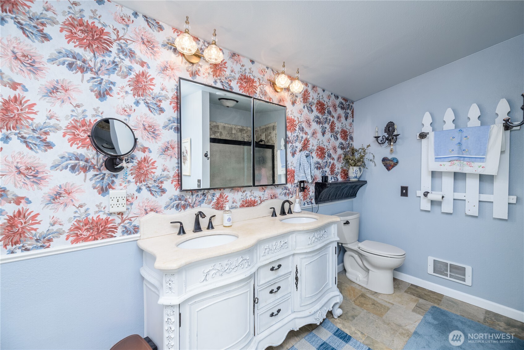 1238 West 11th Street Port Angeles, WA 98363 - Photo 15 of 26 a bathroom with a granite countertop sink mirror and toilet