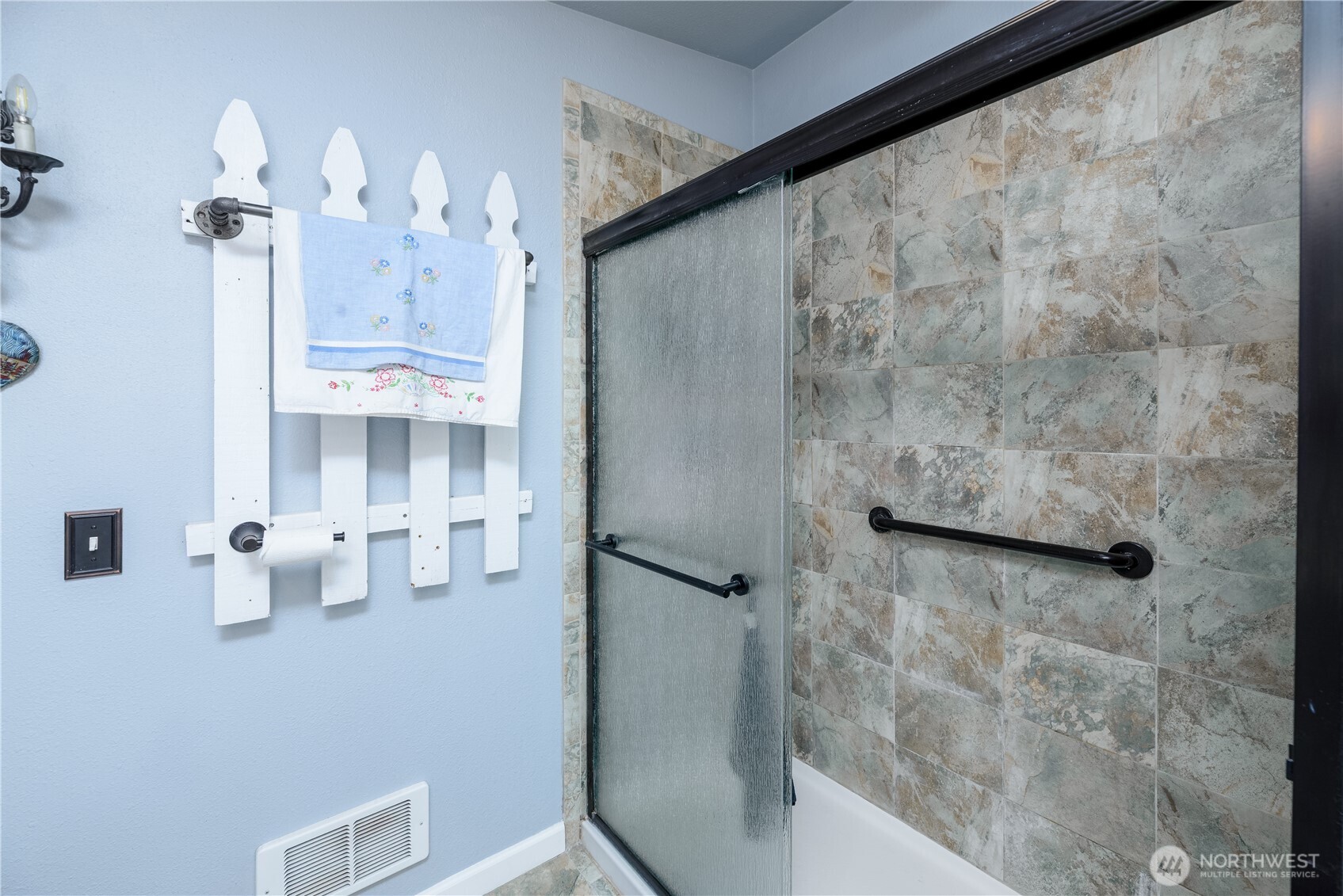 1238 West 11th Street Port Angeles, WA 98363 - Photo 16 of 26 a bathroom with a bathtub sink and toilet