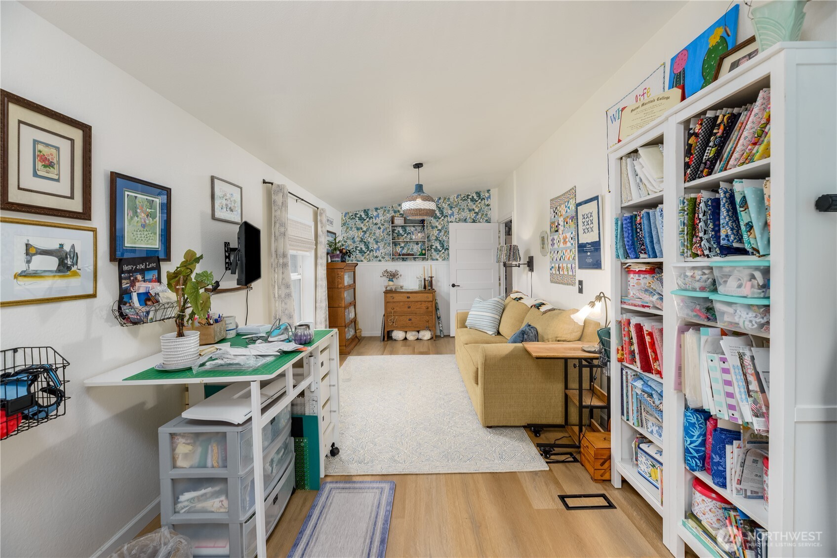 1238 West 11th Street Port Angeles, WA 98363 - Photo 21 of 26 a living room with furniture and a wooden floor