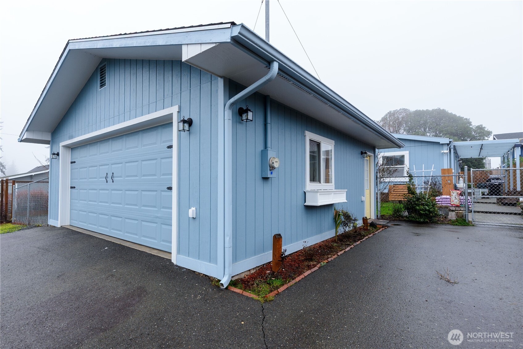 1238 West 11th Street Port Angeles, WA 98363 - Photo 24 of 26 a front view of a house with a yard