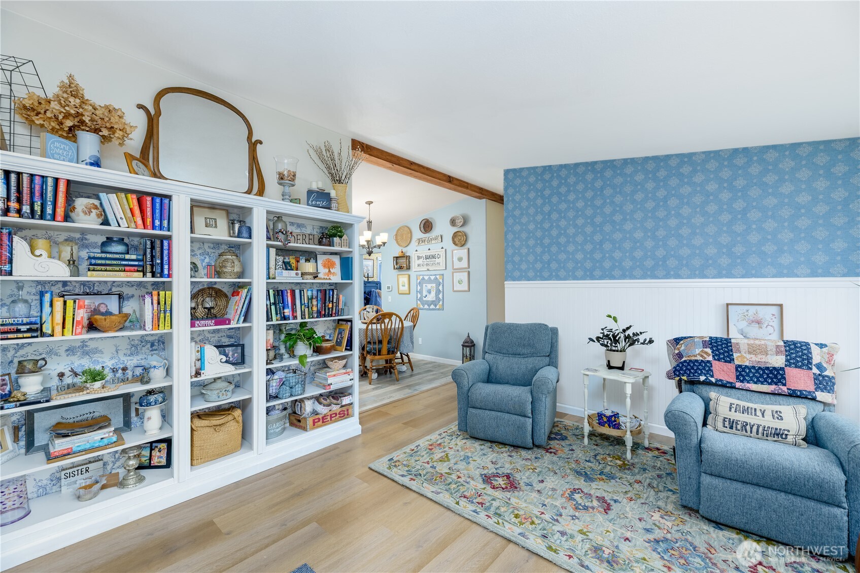1238 West 11th Street Port Angeles, WA 98363 - Photo 4 of 26 a living room with furniture and a book shelf