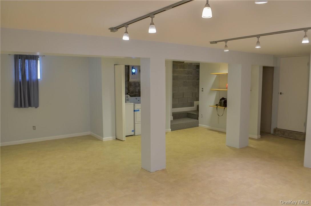 11 Elm Street, Unit 2 Sleepy Hollow, NY 10591 - Photo 15 of 33 an empty room with closet and a bathroom