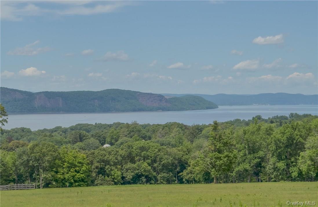 11 Elm Street, Unit 2 Sleepy Hollow, NY 10591 - Photo 19 of 33 a view of a lush green field with mountains in the background