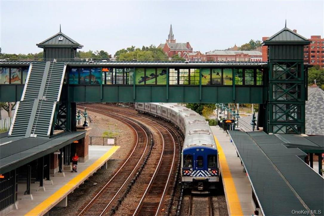 11 Elm Street, Unit 2 Sleepy Hollow, NY 10591 - Photo 29 of 33 a view of a balcony with two chairs and wooden floor