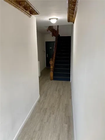 a view of hallway with stairs