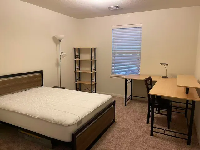 a view of a room with racks on the wall