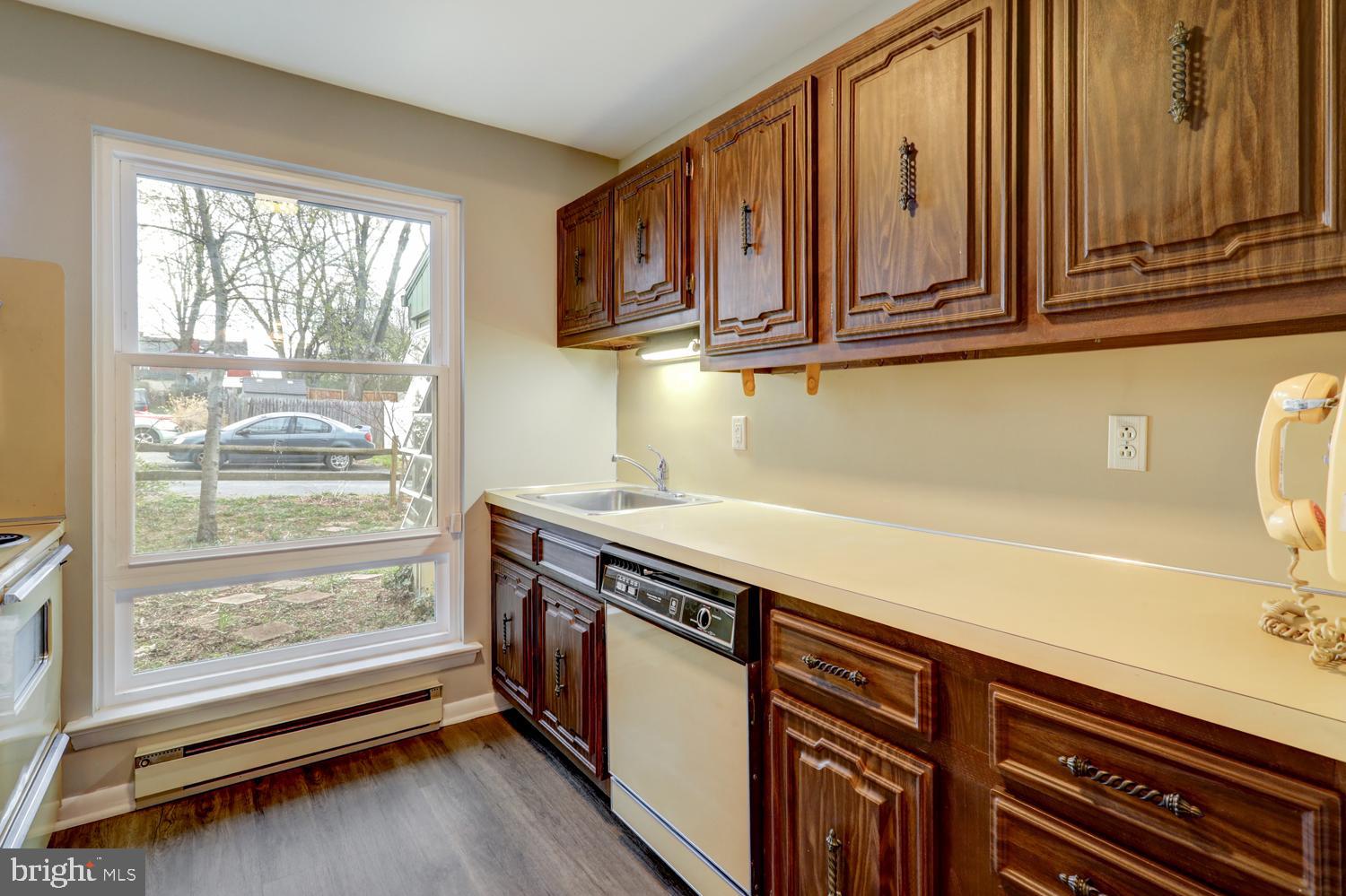 813 Fremont Street Lancaster, PA 17603 - Photo 7 of 33 a view of a kitchen with stainless steel appliances granite countertop a sink and cabinets