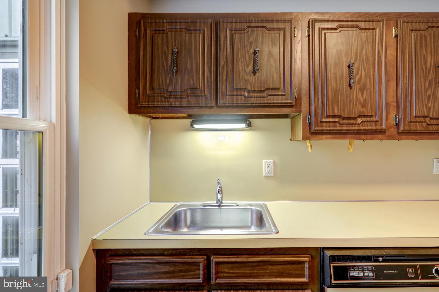 813 Fremont Street Lancaster, PA 17603 - Photo 9 of 33 a sink sitting inside of a kitchen