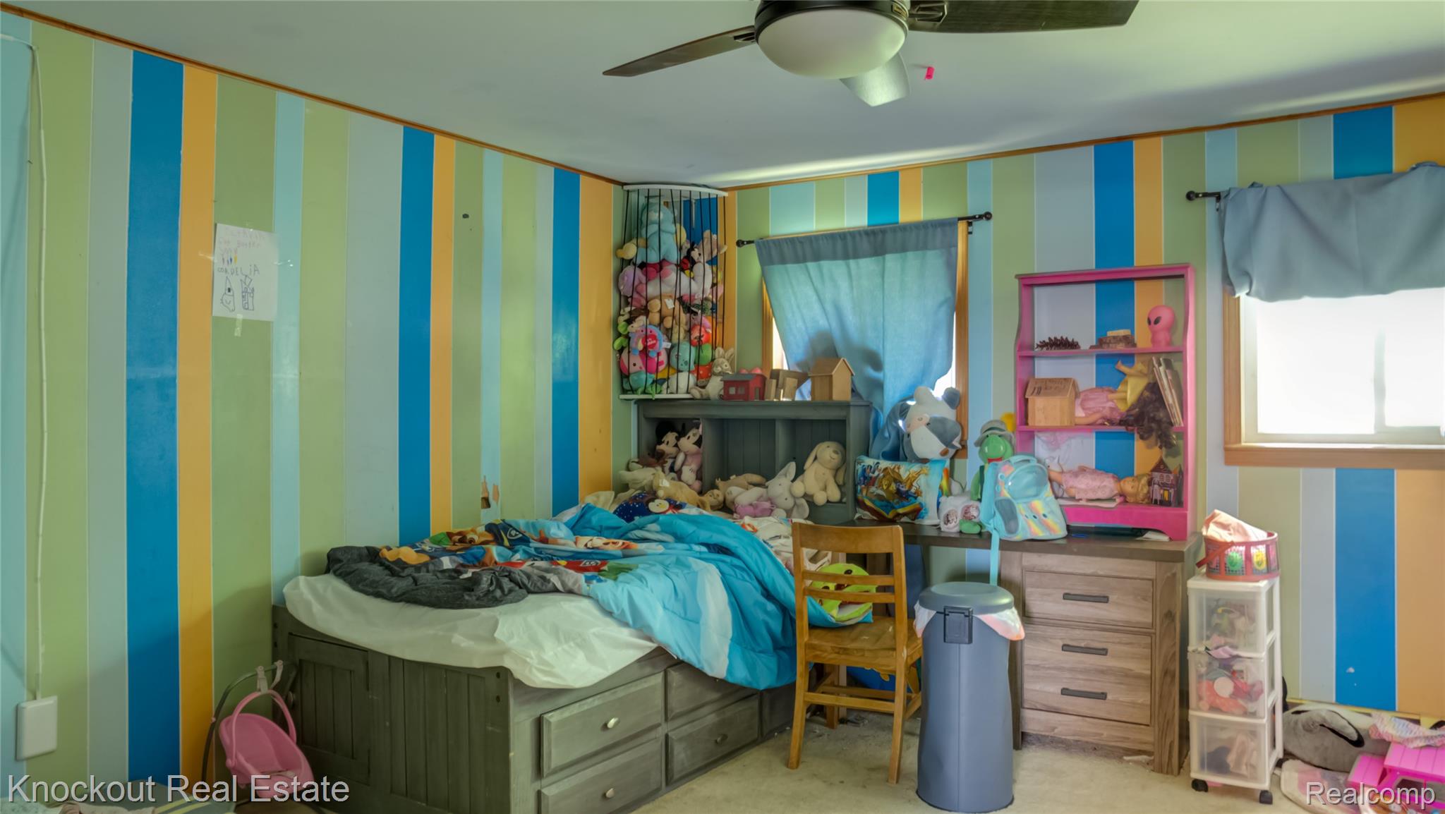 4195 Williamson Road Saginaw, MI 48601 - Photo 25 of 50 Bedroom featuring multi-colored striped walls