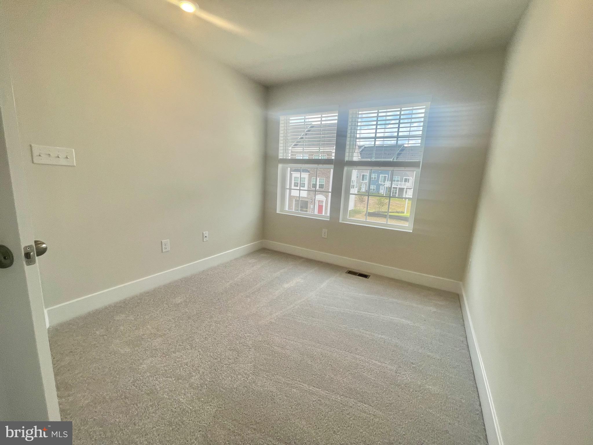 2264 Marcy Drive Frederick, MD 21702 - Photo 18 of 39 a view of an empty room with a window