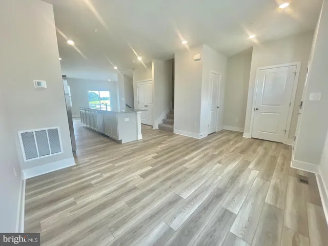 a view of livingroom with furniture and wooden floor