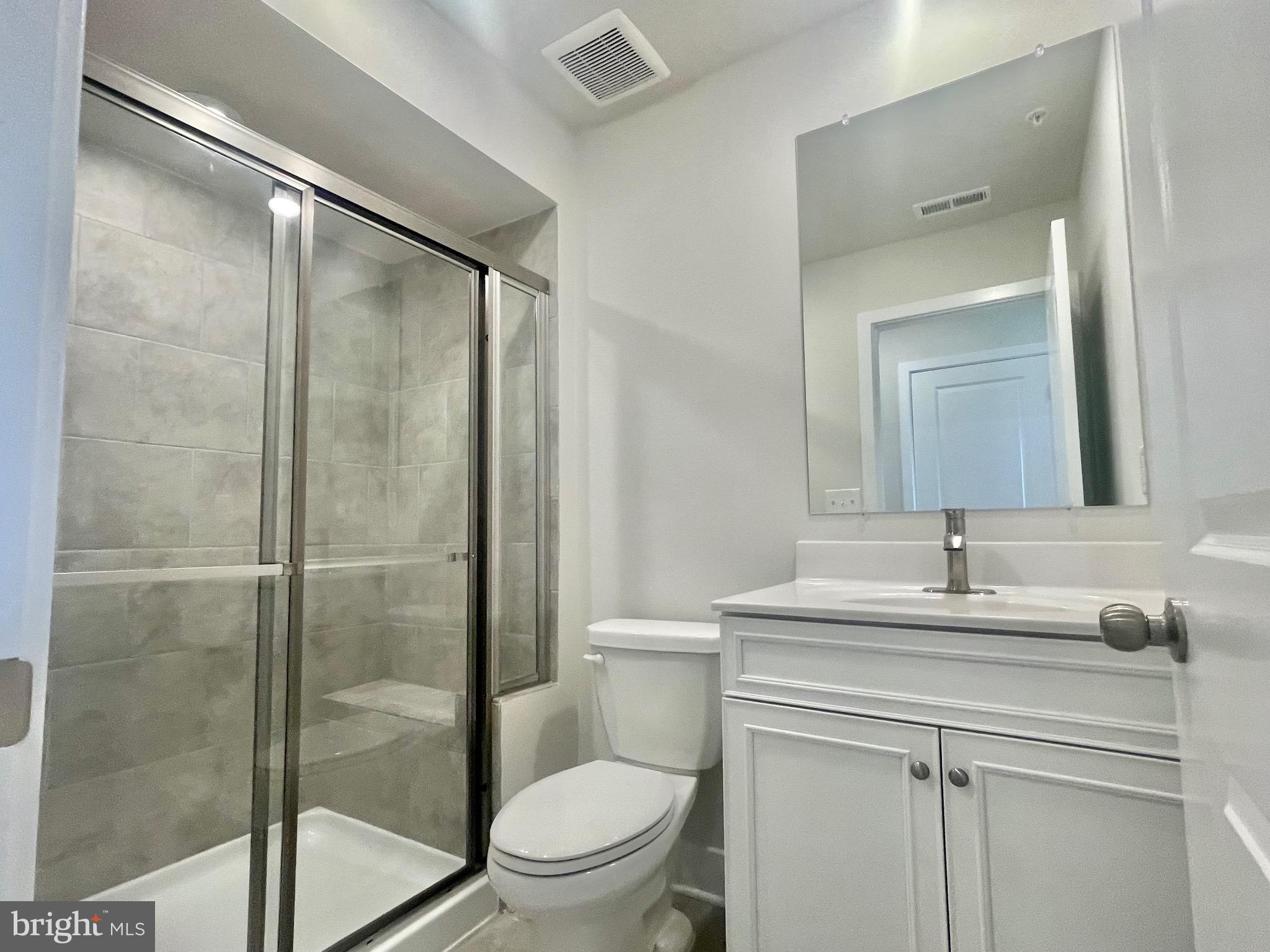 2264 Marcy Drive Frederick, MD 21702 - Photo 35 of 39 a bathroom with a sink toilet and shower