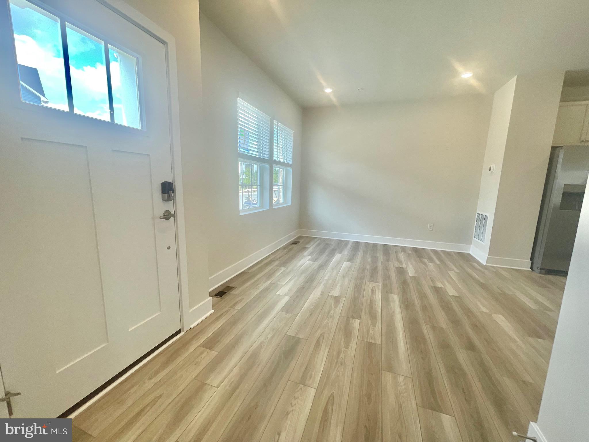 2264 Marcy Drive Frederick, MD 21702 - Photo 6 of 39 a view of wooden floor and windows in a room