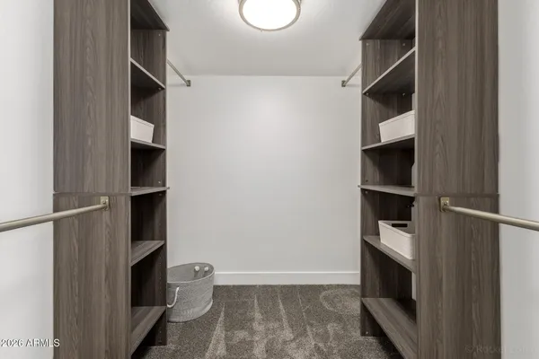 a bathroom with a shower and a toilet