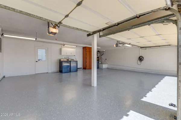 a view of house with outdoor space and swimming pool