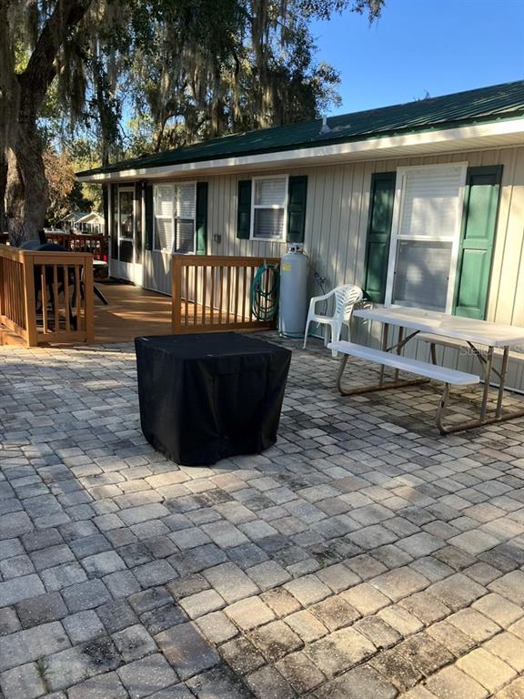 25079 Northeast 140th Loop Salt Springs, FL 32134 - Photo 18 of 23 a view of house with a outdoor space