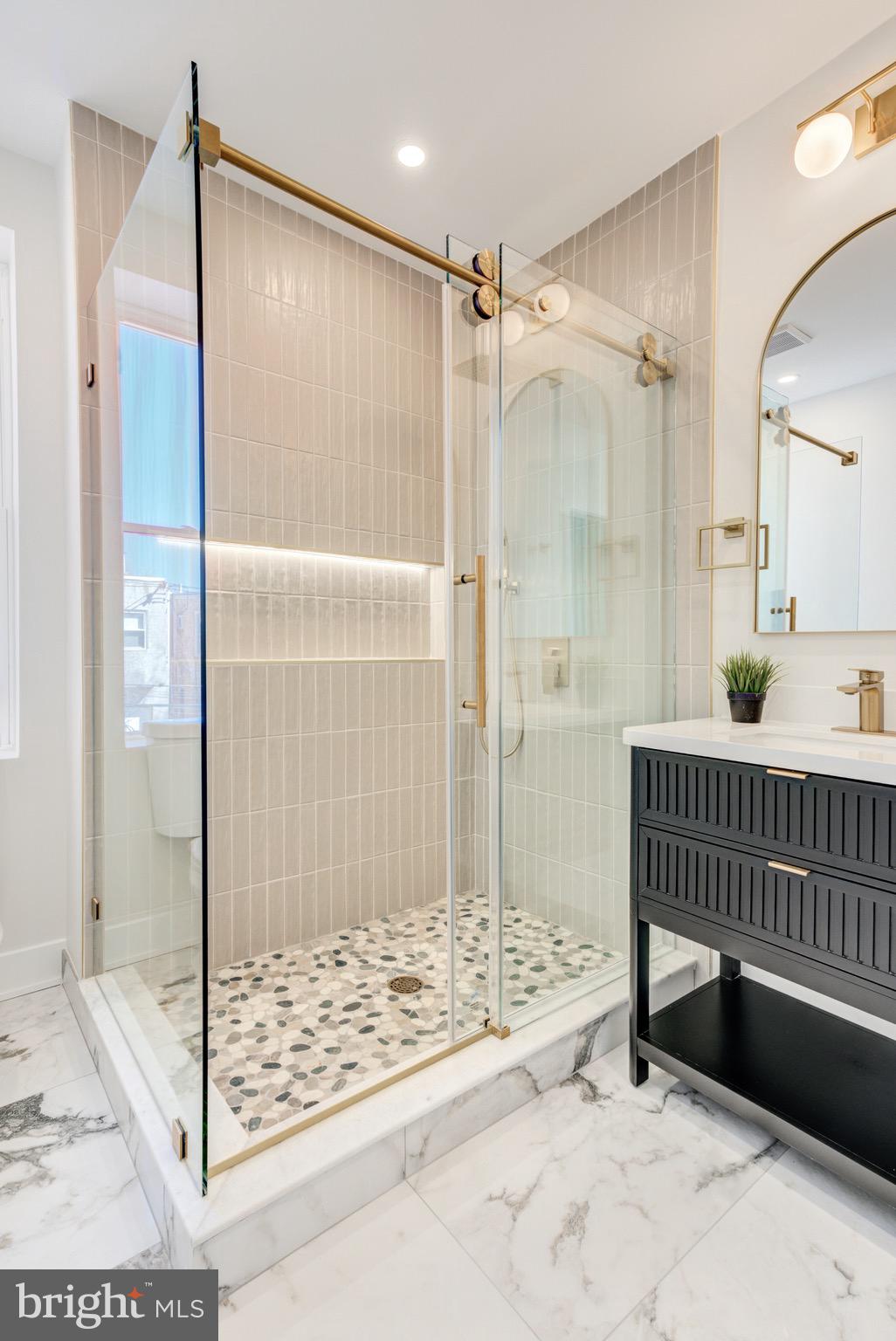 1924 South Lambert Street Philadelphia, PA 19145 - Photo 27 of 35 a bathroom with a shower and a sink