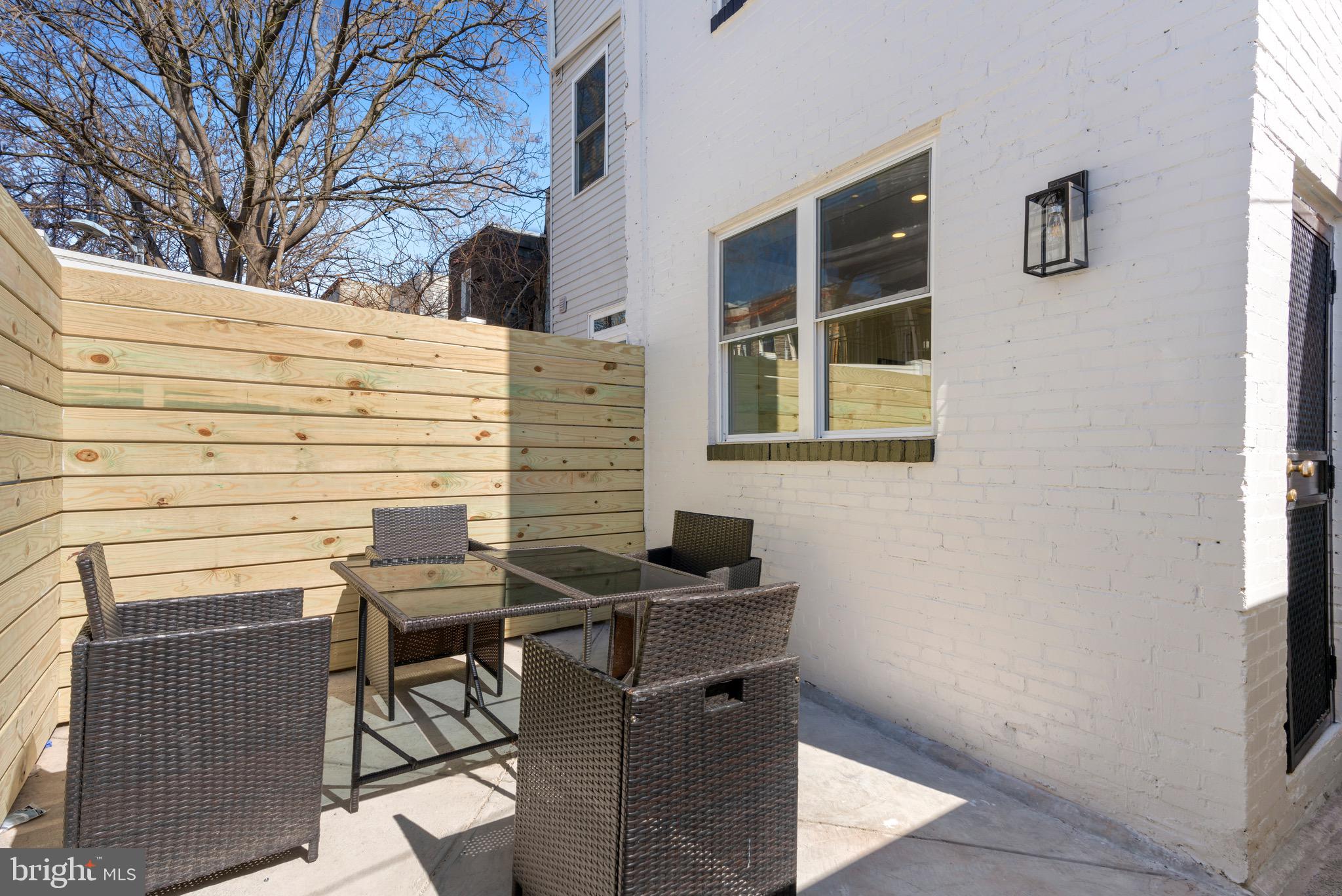 1924 South Lambert Street Philadelphia, PA 19145 - Photo 33 of 35 a view of a patio with a table and chairs