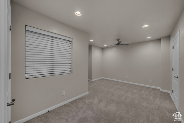 101 Chuckwalla Lane Springdale, UT 84767 - Photo 41 of 51 Empty room with recessed lighting, light colored carpet, and a ceiling fan